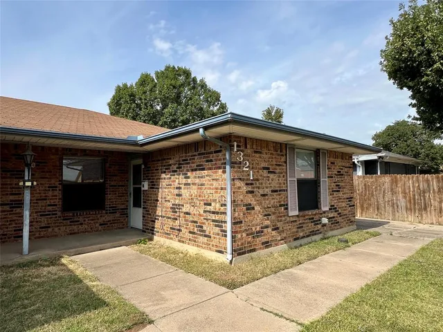 a front view of a house with a garage