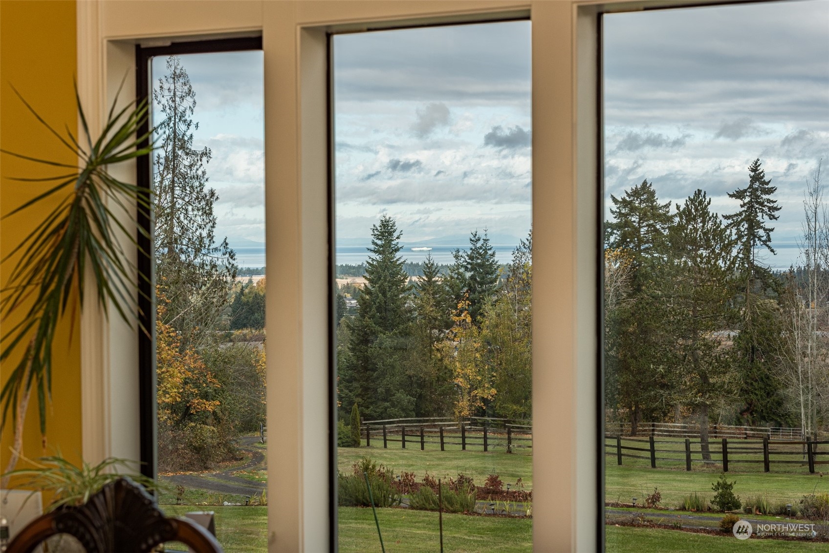 588 Simdars Road Sequim, WA 98382 - Photo 15 of 40 a view of a glass door and a window
