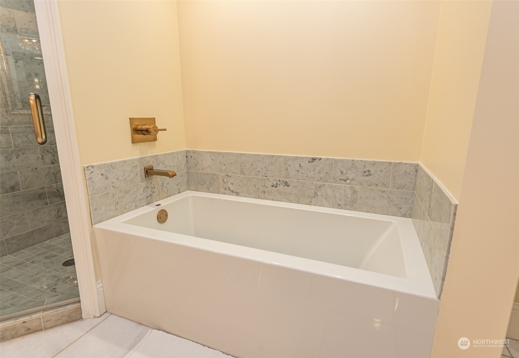 588 Simdars Road Sequim, WA 98382 - Photo 21 of 40 a white bath tub sitting in a bathroom
