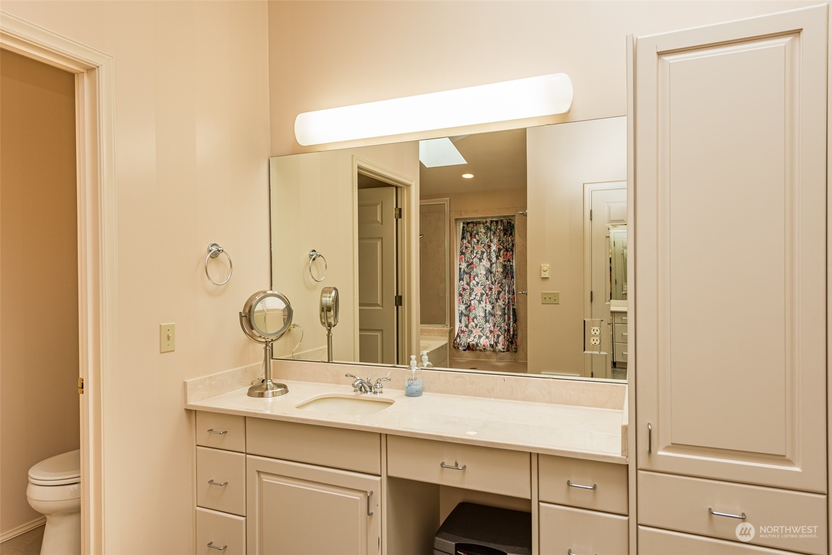 588 Simdars Road Sequim, WA 98382 - Photo 28 of 40 a bathroom with a sink and a mirror