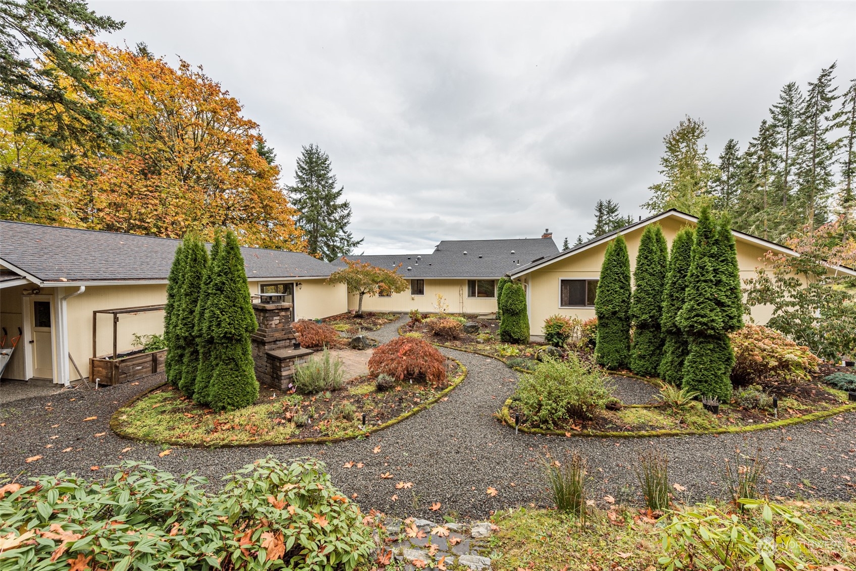 588 Simdars Road Sequim, WA 98382 - Photo 35 of 40 a front view of a house with garden