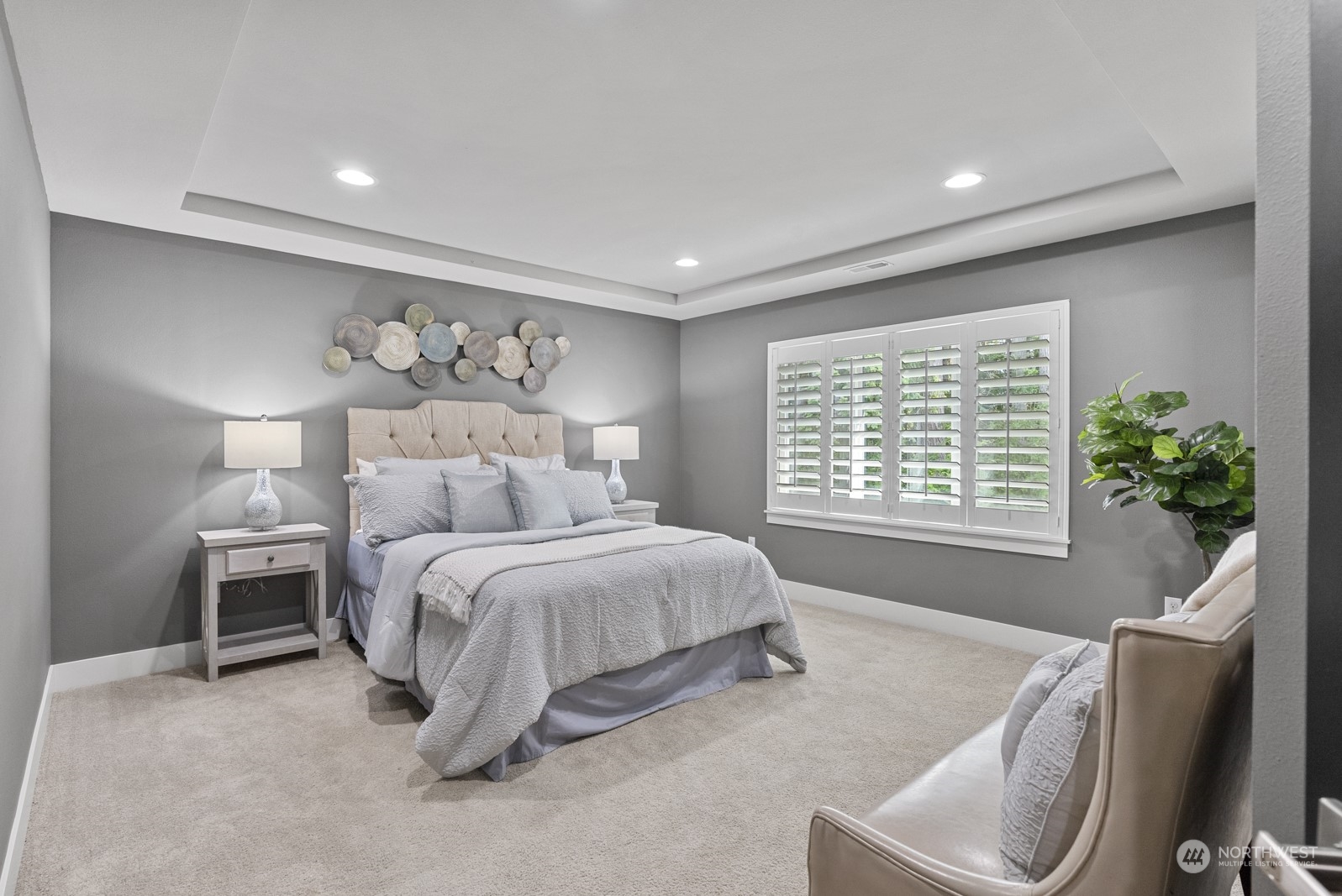 4404 181st Street Southeast Bothell, WA 98012 - Photo 19 of 37 a spacious bedroom with a bed and a window