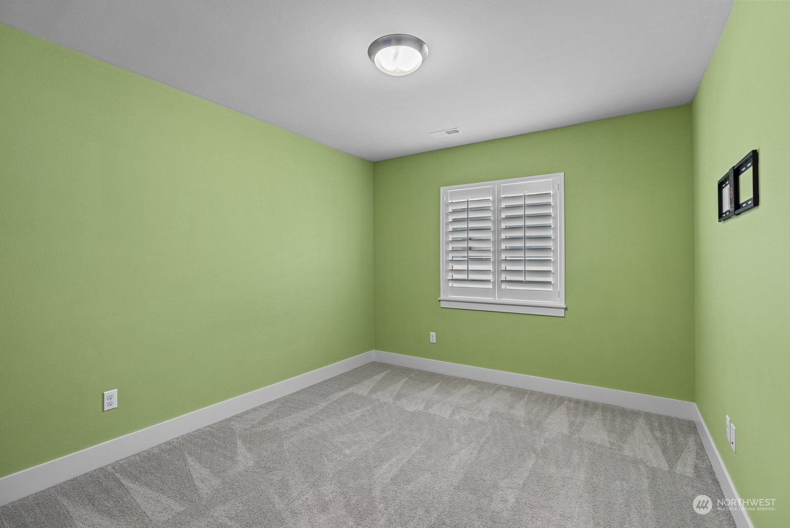 4404 181st Street Southeast Bothell, WA 98012 - Photo 32 of 37 a view of a room with a window and a ceiling fan