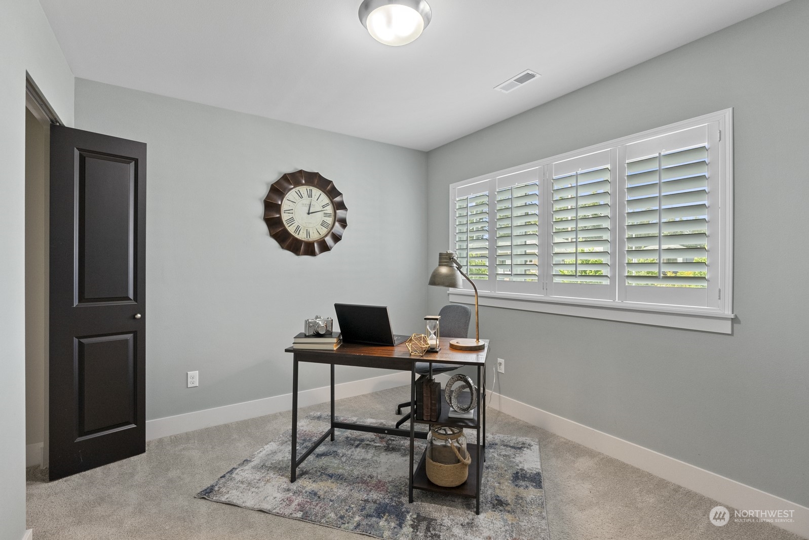 4404 181st Street Southeast Bothell, WA 98012 - Photo 33 of 37 a workspace with furniture and a window