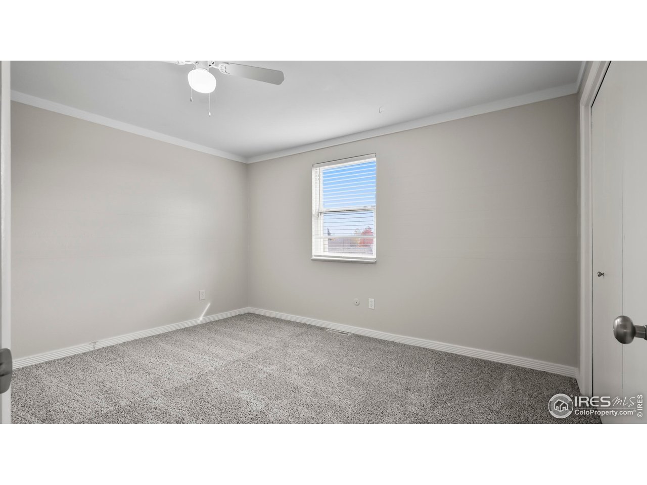215 Chestnut Street, Unit A5 Windsor, CO 80550 - Photo 11 of 18 a black and white photo of a living room