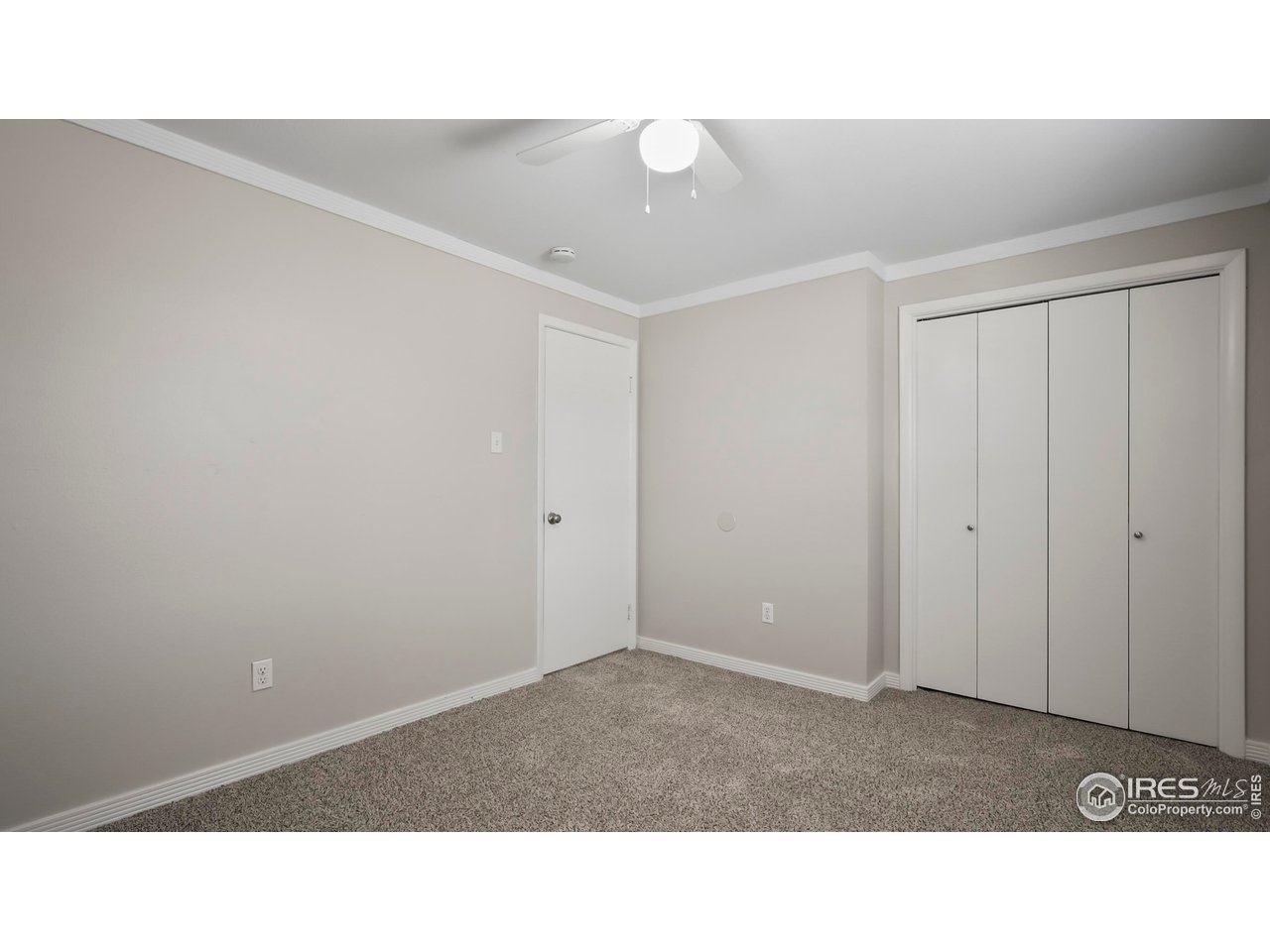 215 Chestnut Street, Unit A5 Windsor, CO 80550 - Photo 14 of 18 a black and white photo of a living room