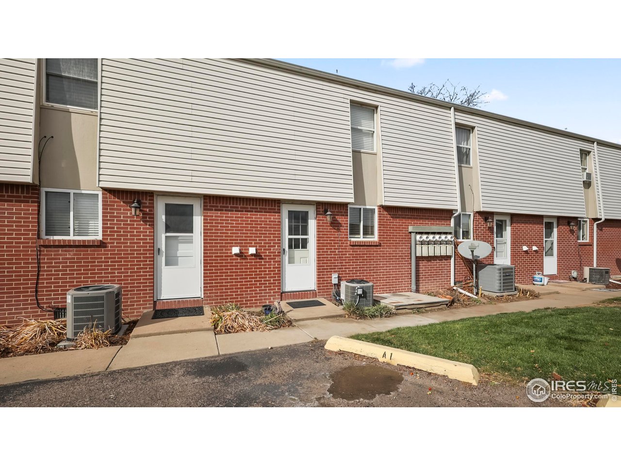 215 Chestnut Street, Unit A5 Windsor, CO 80550 - Photo 16 of 18 a black and white photo of a house