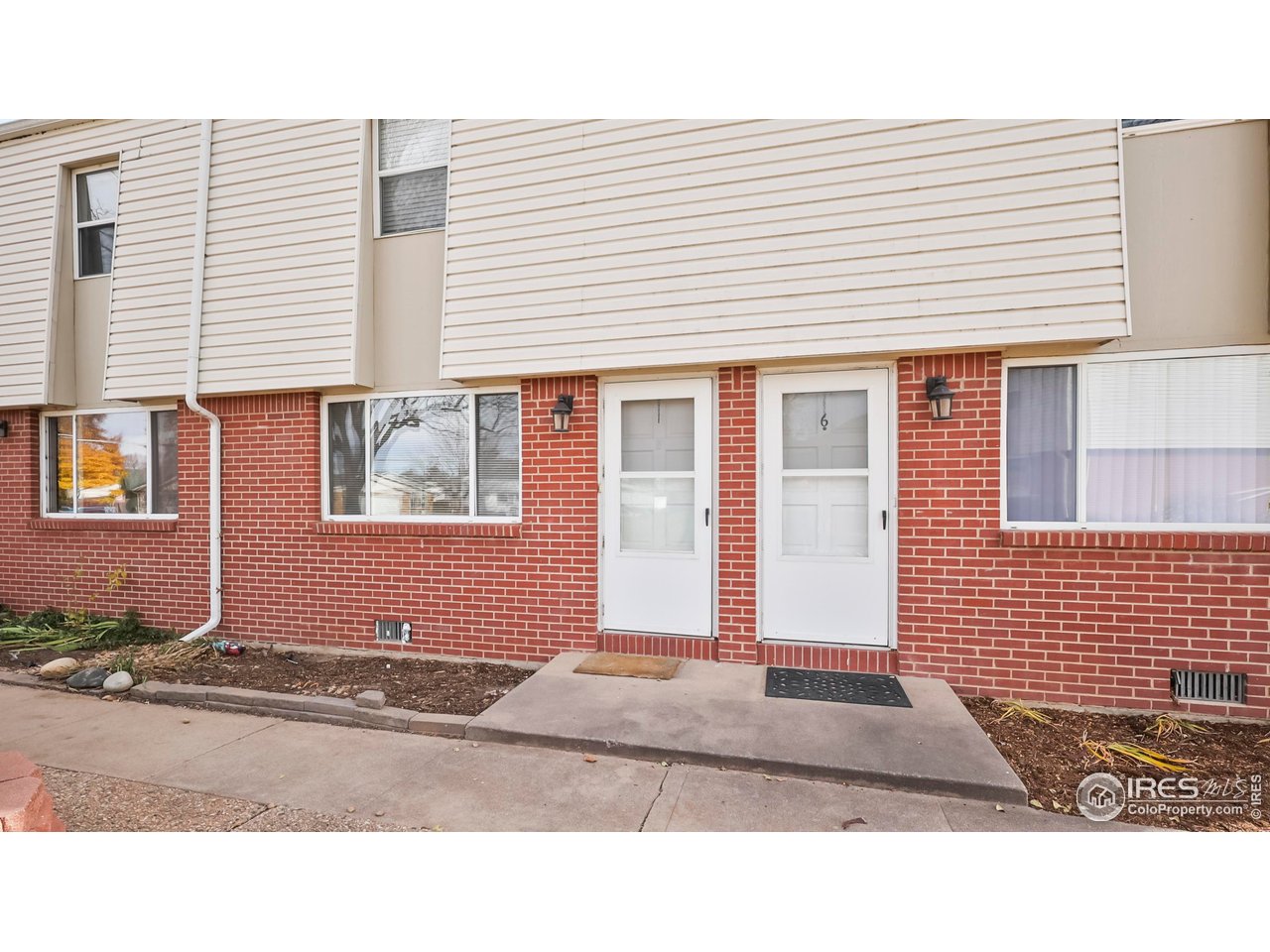 215 Chestnut Street, Unit A5 Windsor, CO 80550 - Photo 18 of 18 a black and white photo of a house