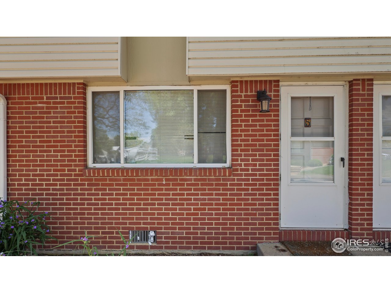 215 Chestnut Street, Unit A5 Windsor, CO 80550 - Photo 2 of 18 a bathroom with a sink