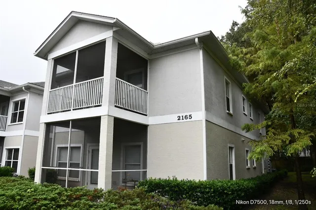 a kitchen with a sink a stove and refrigerator