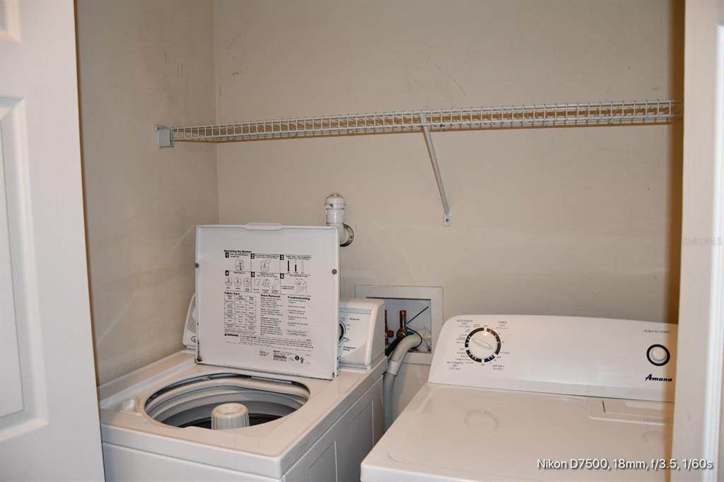 2165 Northwest 10th Street, Unit D Gainesville, FL 32609 - Photo 8 of 12 a utility room with dryer and washer