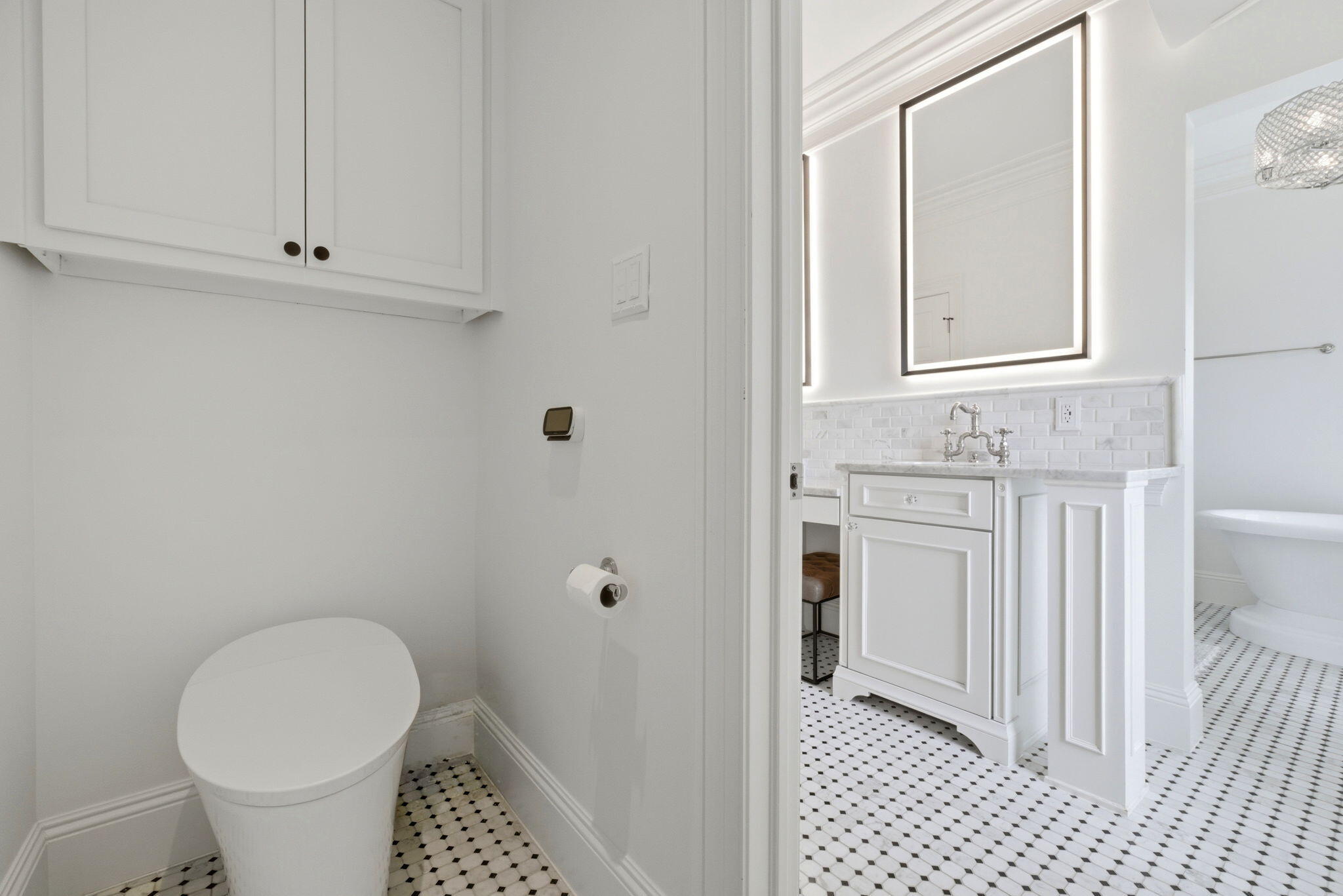 31061 Peninsula Drive Orange Beach, AL 36561 - Photo 32 of 93 a bathroom with a sink toilet and vanity