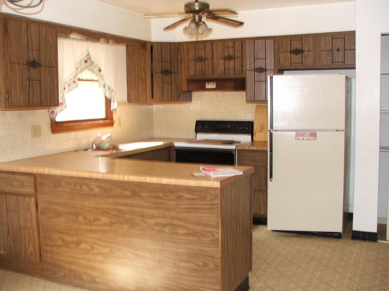 28 Decker Road Bushkill, PA 18324 - Photo 2 of 10 a kitchen with a refrigerator and a sink
