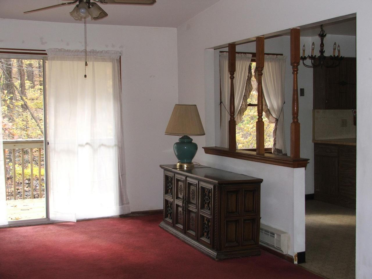 28 Decker Road Bushkill, PA 18324 - Photo 3 of 10 a view of a hallway with windows and chandelier
