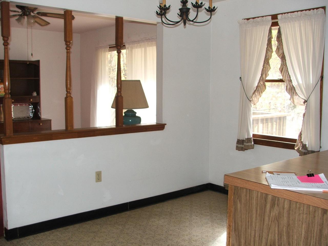 28 Decker Road Bushkill, PA 18324 - Photo 4 of 10 a living room with a bed and a window