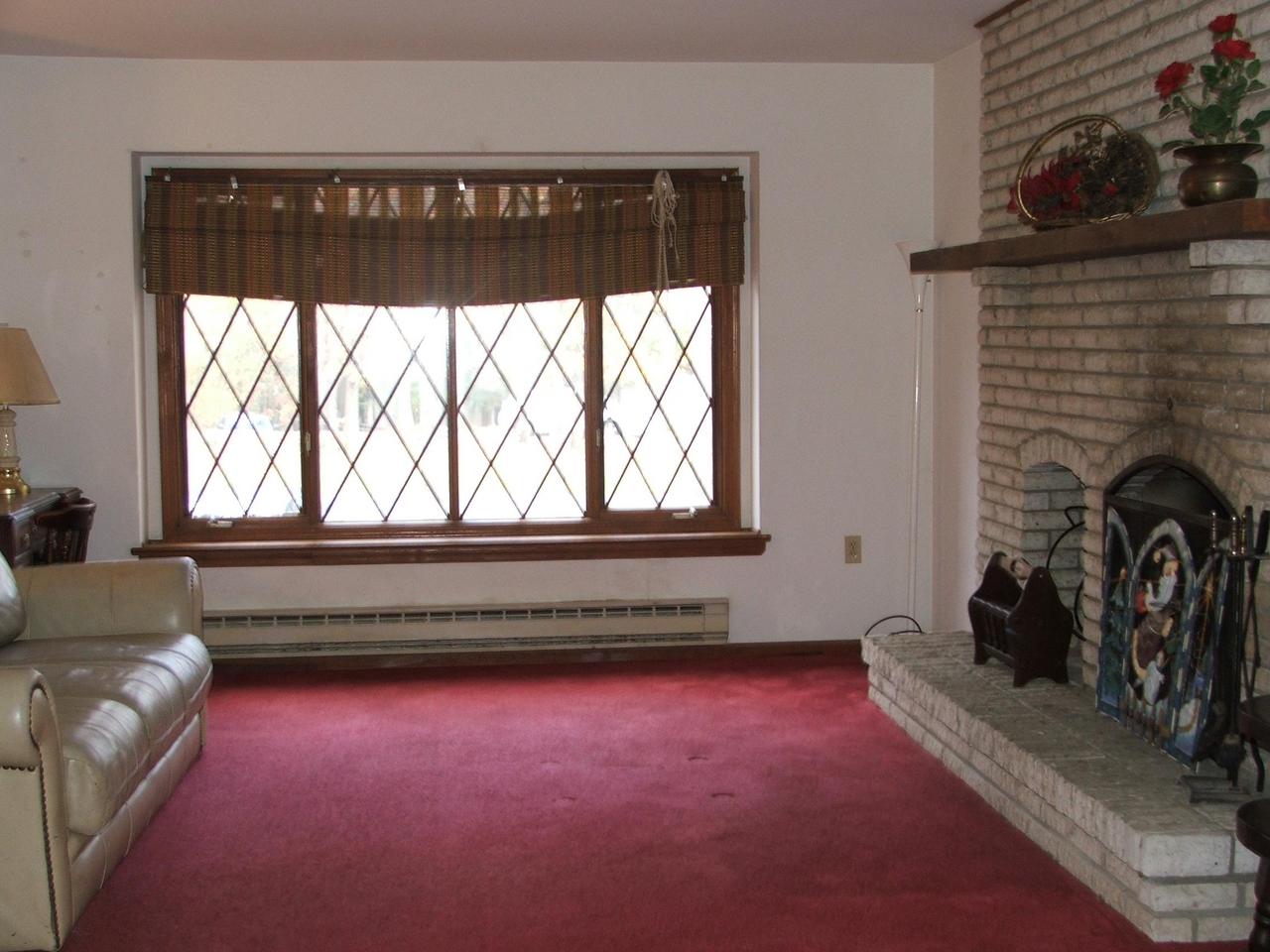 28 Decker Road Bushkill, PA 18324 - Photo 6 of 10 a living room with furniture and a fireplace