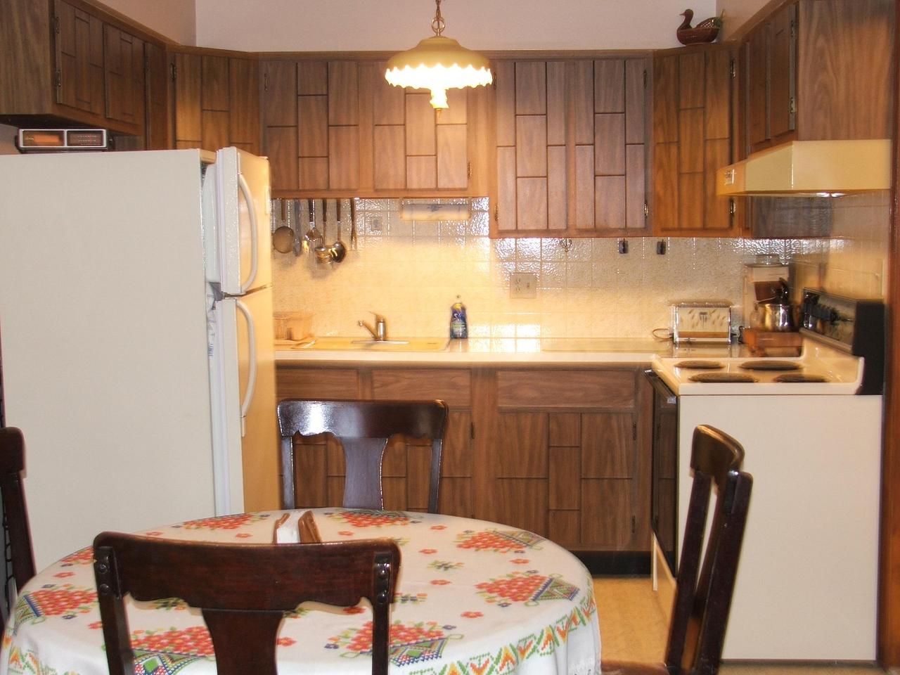 28 Decker Road Bushkill, PA 18324 - Photo 8 of 10 a kitchen with a sink refrigerator and cabinets