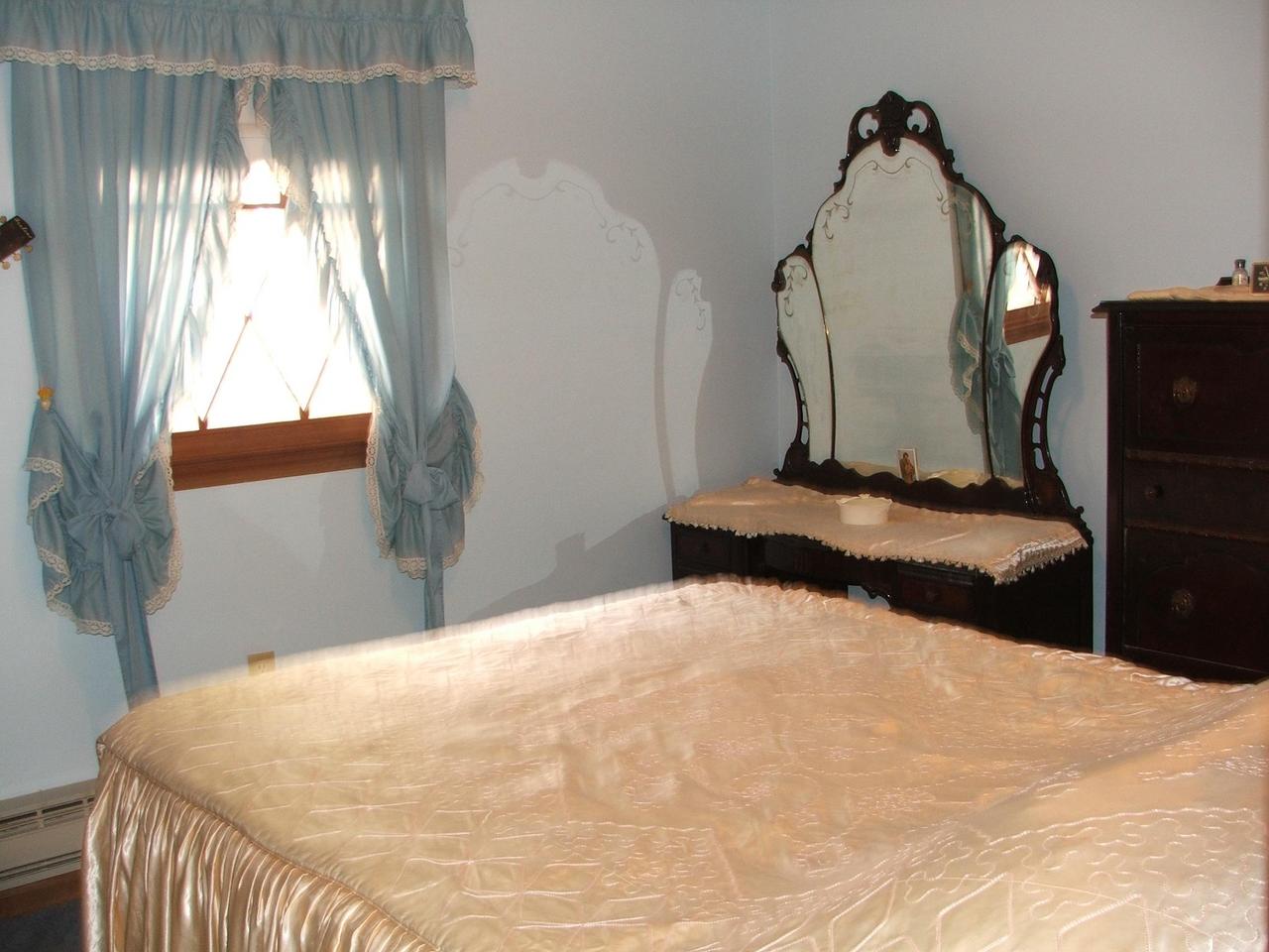 28 Decker Road Bushkill, PA 18324 - Photo 10 of 10 a bedroom with a bed and a window
