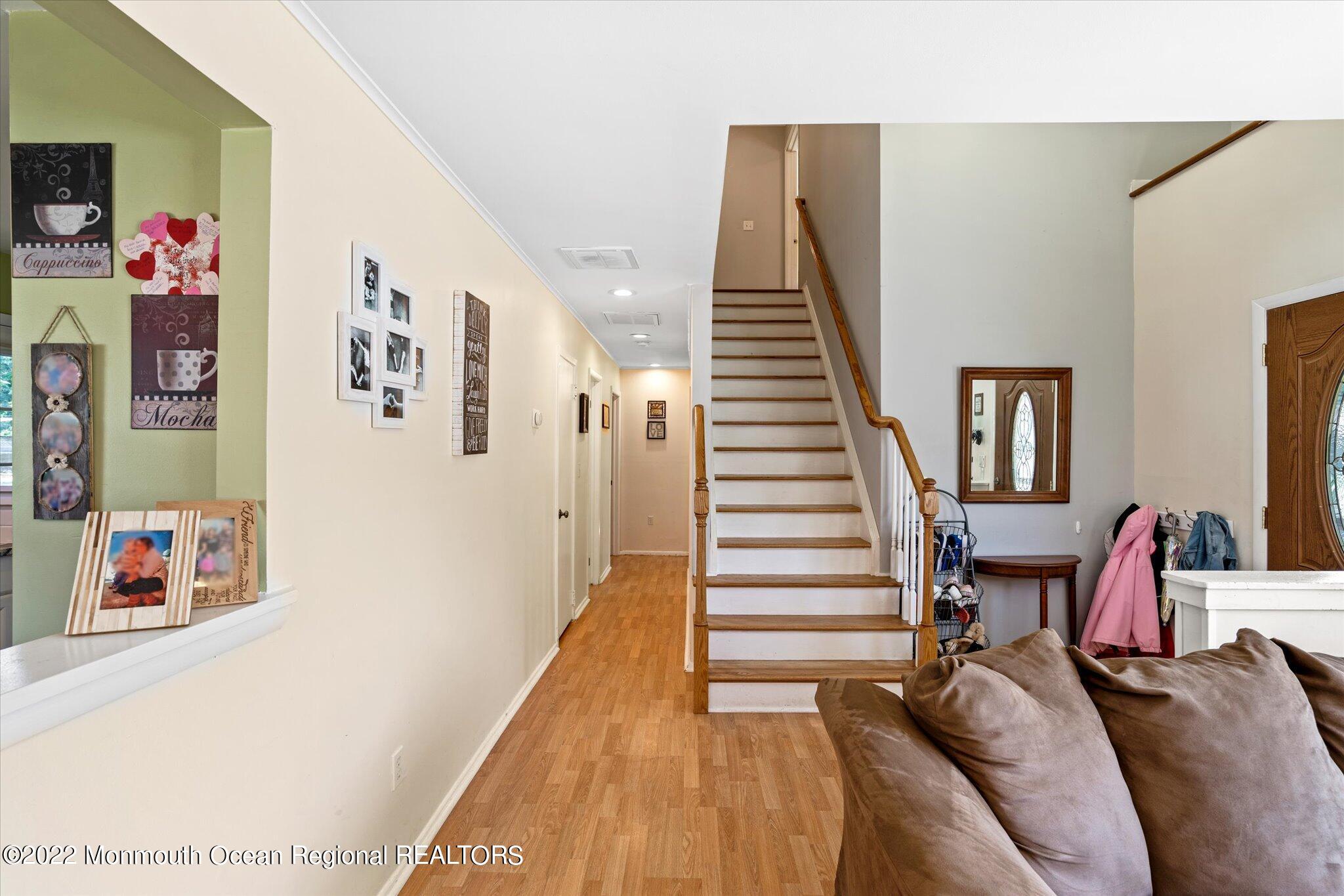 2 Sunset Drive Howell, NJ 07731 - Photo 27 of 41 a bed room with a bed and a couch
