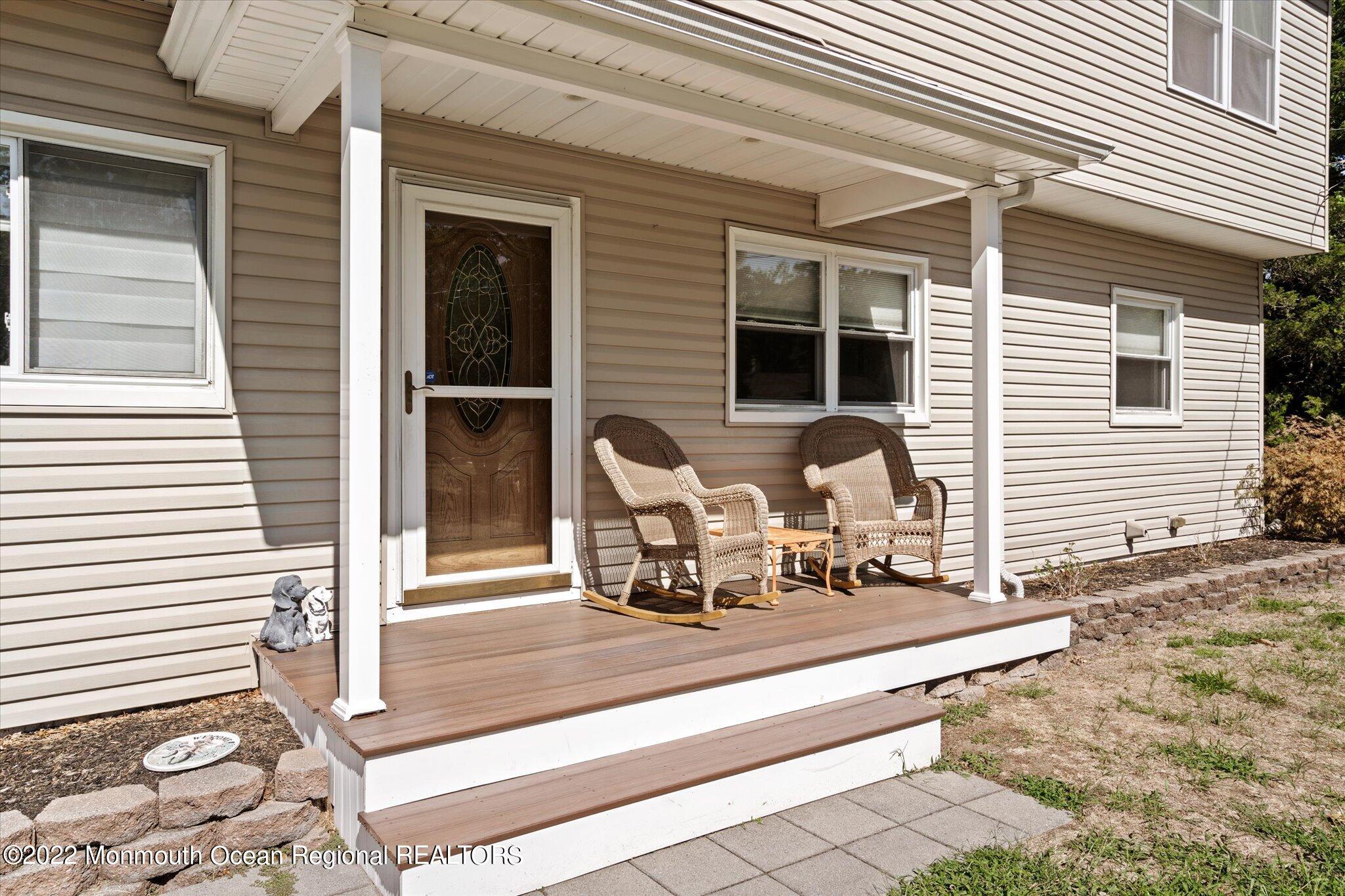 2 Sunset Drive Howell, NJ 07731 - Photo 36 of 41 a view of a lounge chair in front of house