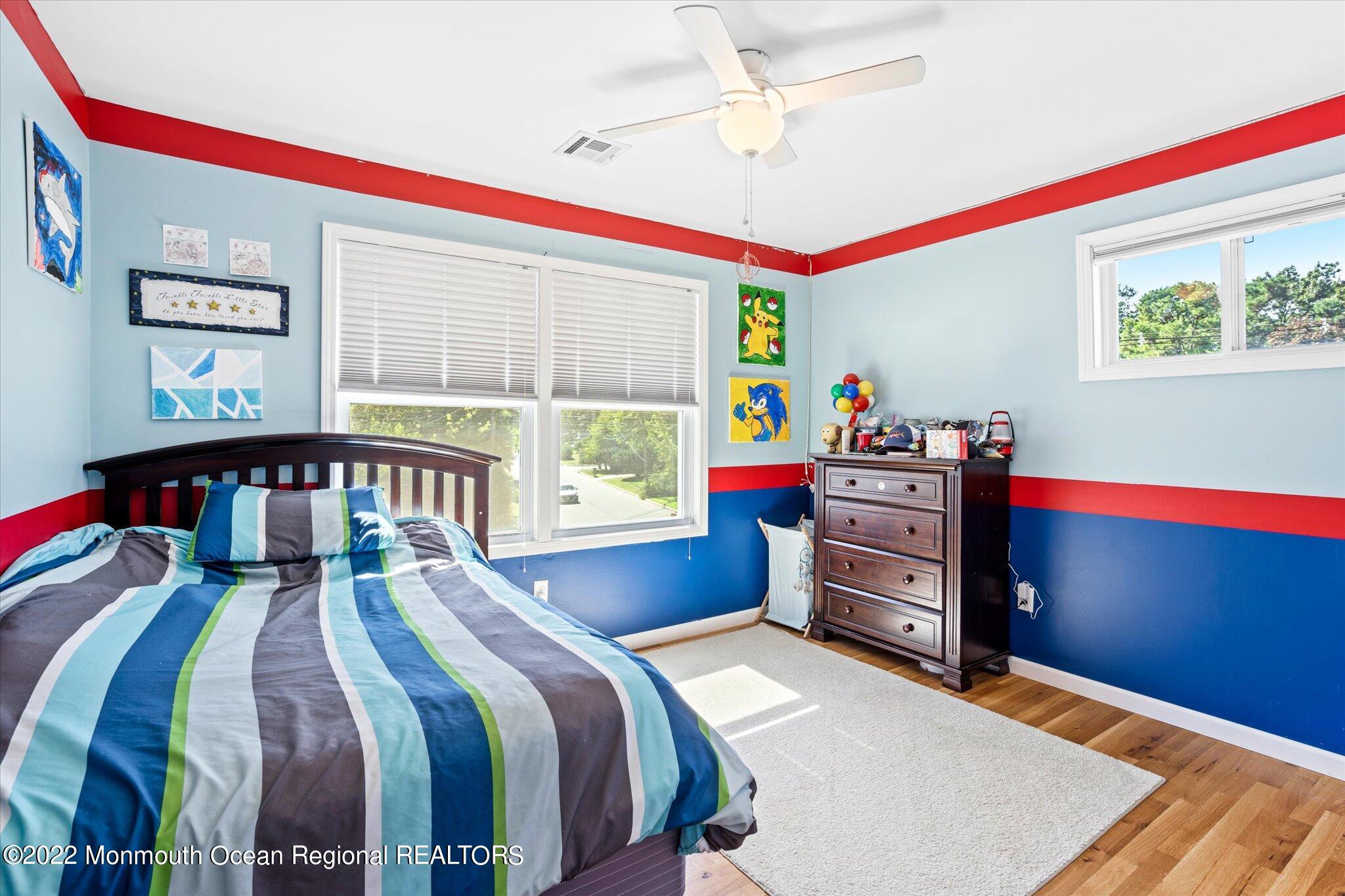 2 Sunset Drive Howell, NJ 07731 - Photo 10 of 41 a bed room with a bed and a book