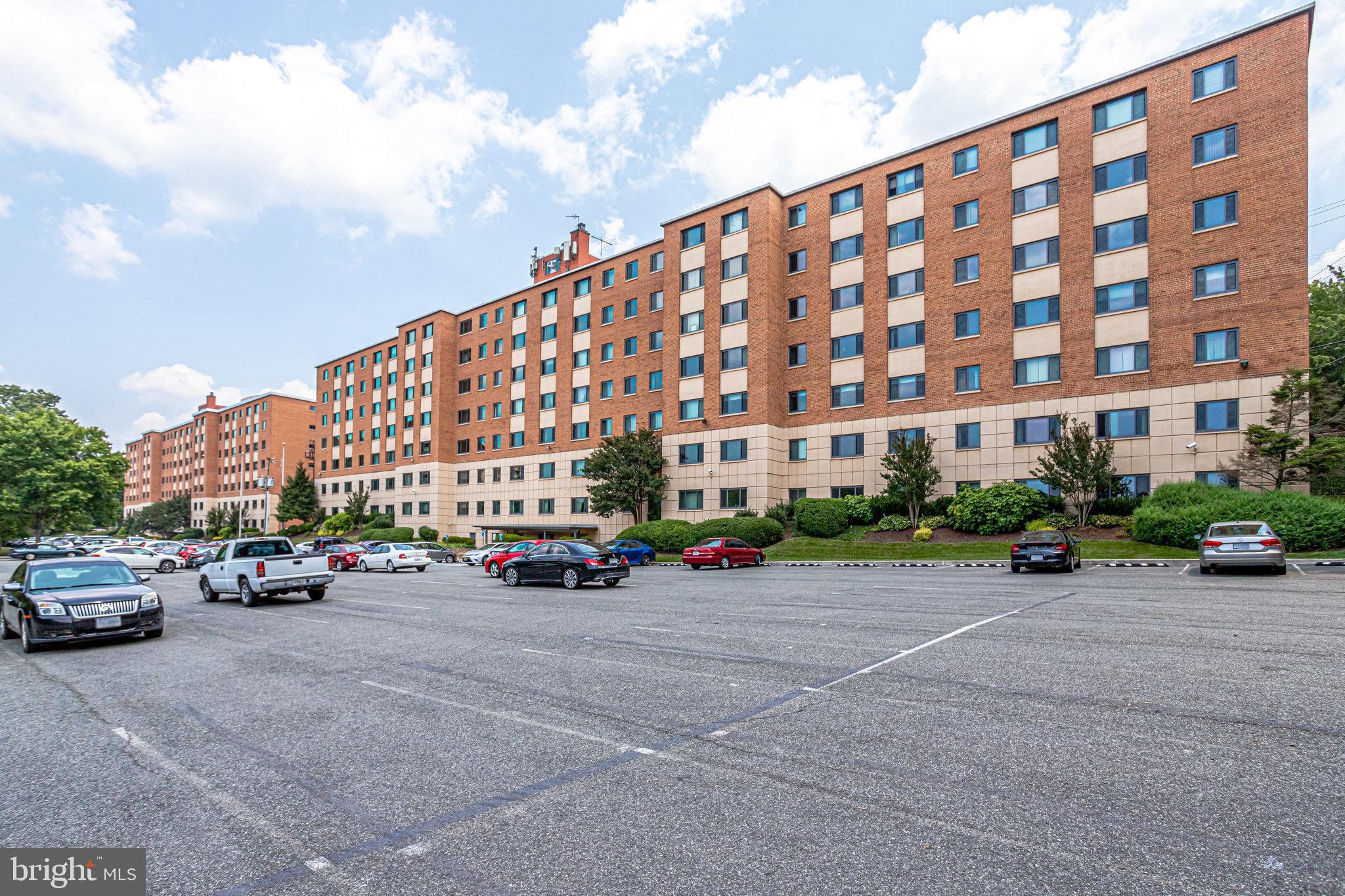 1200 South Arlington Ridge Road, Unit 612 Arlington, VA 22202 - Photo 4 of 27 a cars parked in front of a building
