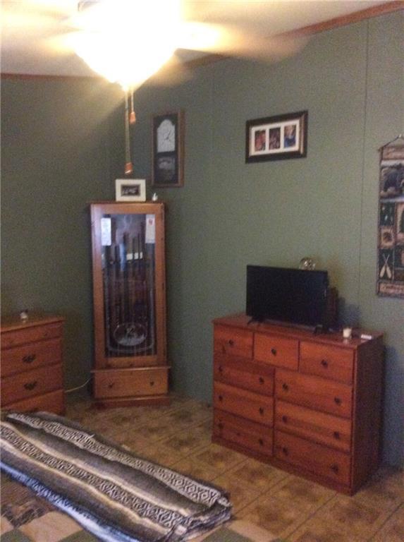 566 Rogers Point Road Steuben, ME 04680 - Photo 12 of 28 Master Bedroom with walk-in closet...