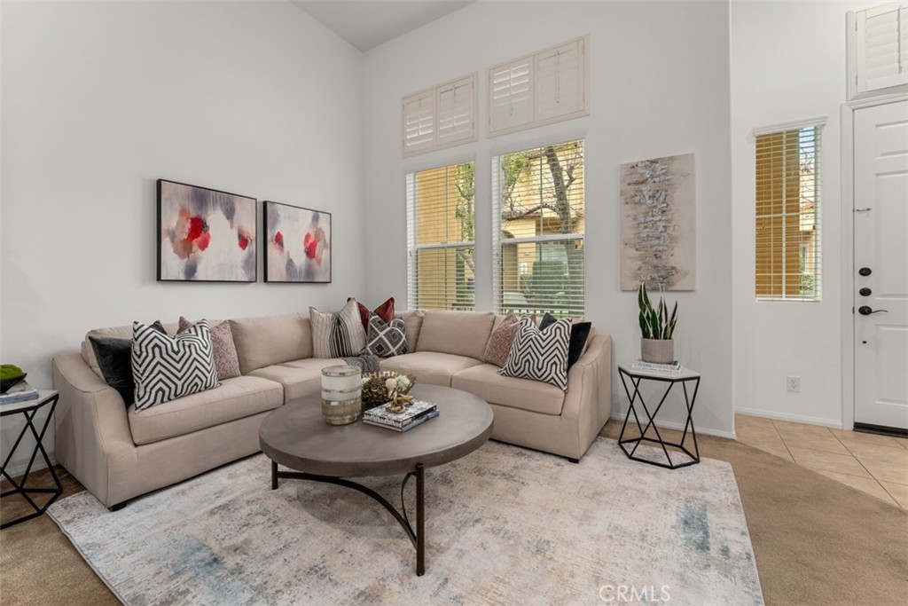 8483 Kendra Loop Orange, CA 92867 - Photo 4 of 30 a living room with furniture and a large window