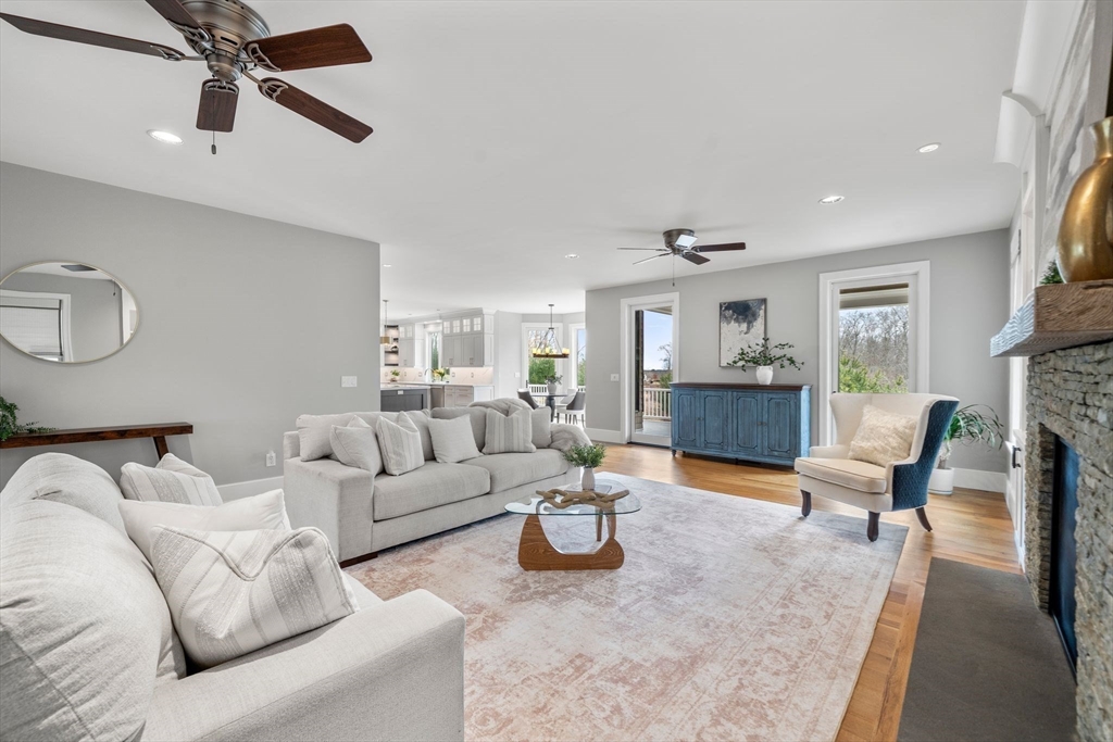 9 Wedge Way Rehoboth, MA 02769 - Photo 12 of 42 a living room with furniture and a fireplace
