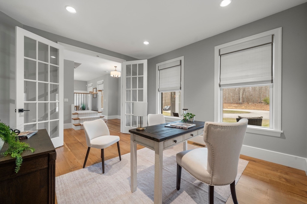 9 Wedge Way Rehoboth, MA 02769 - Photo 14 of 42 a view of a dining room with furniture and wooden floor