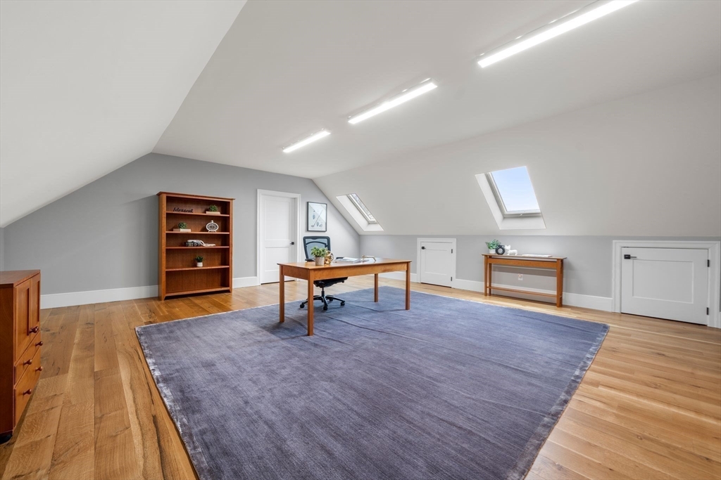 9 Wedge Way Rehoboth, MA 02769 - Photo 20 of 42 a living room with furniture and a wooden floor