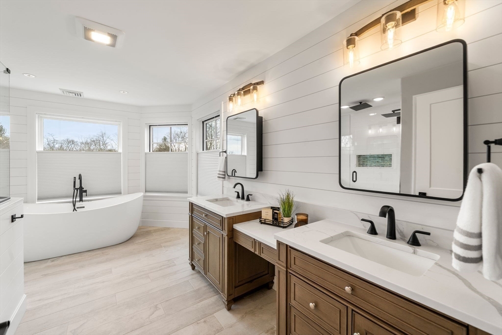 9 Wedge Way Rehoboth, MA 02769 - Photo 23 of 42 a bathroom with a granite countertop sink double vanity and mirror