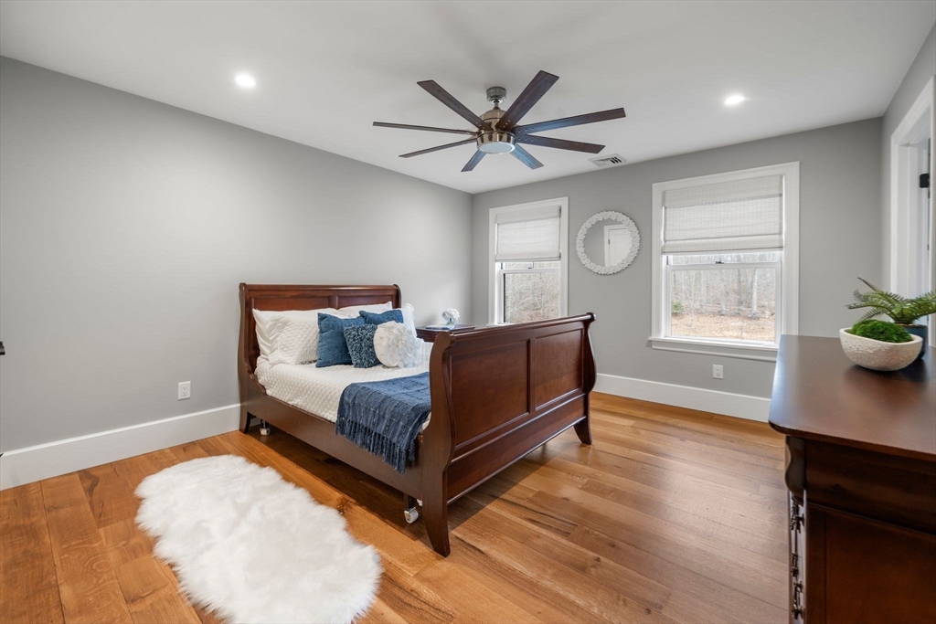 9 Wedge Way Rehoboth, MA 02769 - Photo 25 of 42 a living room with a bed furniture and a window