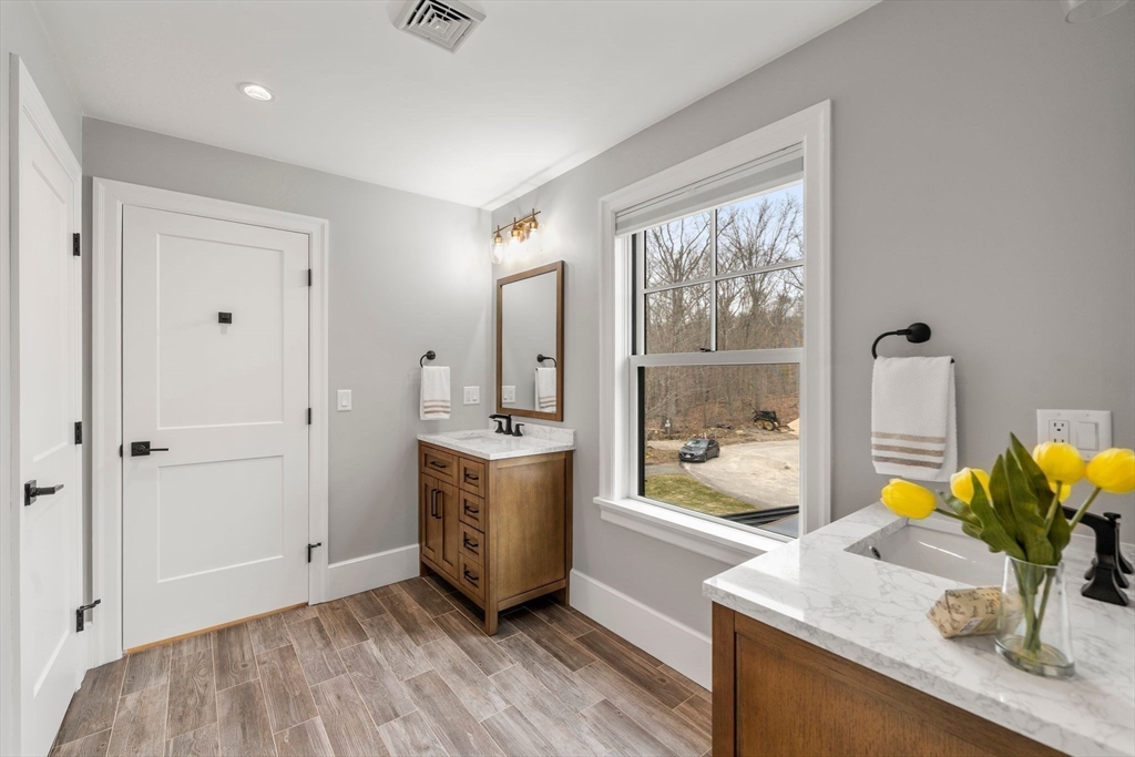 9 Wedge Way Rehoboth, MA 02769 - Photo 26 of 42 a kitchen with a sink and a window
