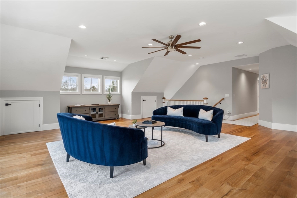 9 Wedge Way Rehoboth, MA 02769 - Photo 30 of 42 a living room with furniture and a wooden floor
