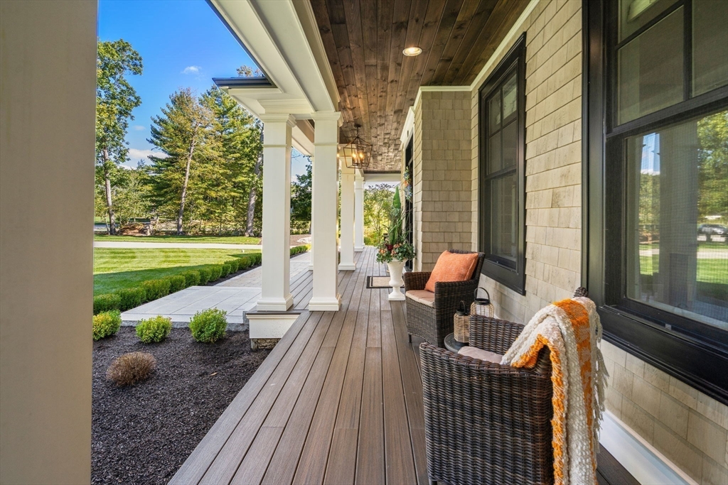 9 Wedge Way Rehoboth, MA 02769 - Photo 35 of 42 a balcony with wooden floor and outdoor seating