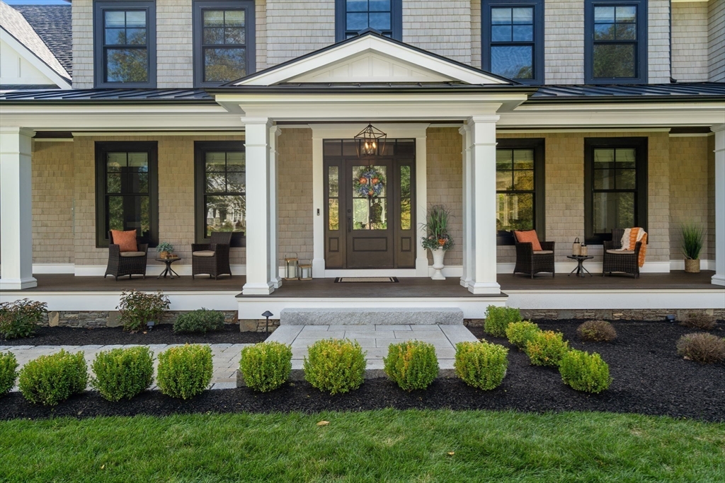 9 Wedge Way Rehoboth, MA 02769 - Photo 36 of 42 a front view of a house with a garden