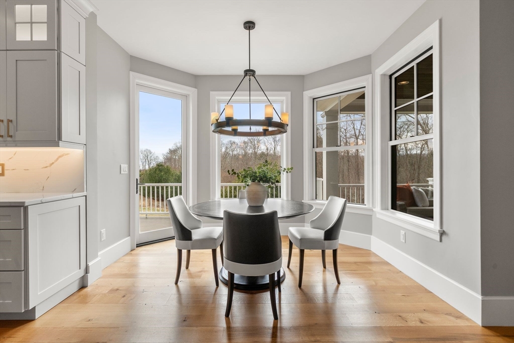 9 Wedge Way Rehoboth, MA 02769 - Photo 10 of 42 a dining room with furniture window and wooden floor