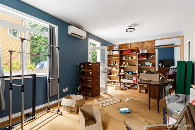 a room with furniture and a large window