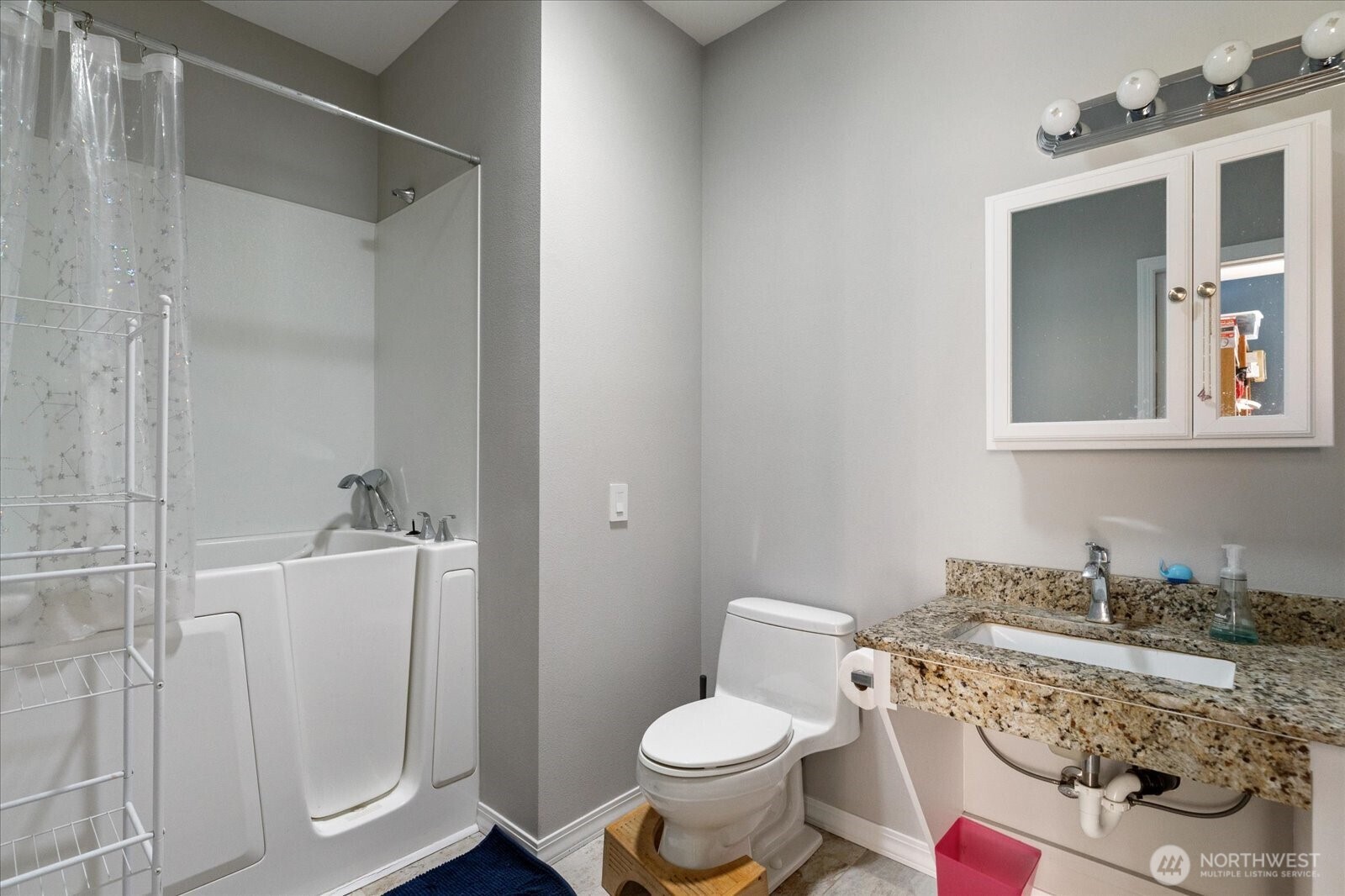 2013 Goss Ridge Road Freeland, WA 98249 - Photo 21 of 24 a bathroom with a granite countertop sink toilet and shower