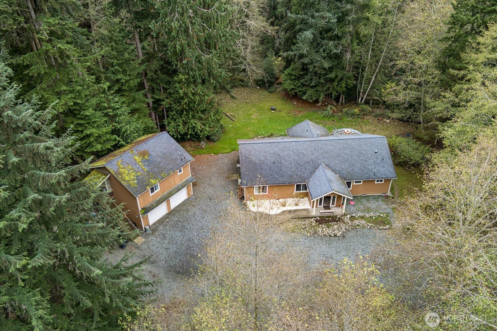2013 Goss Ridge Road Freeland, WA 98249 - Photo 3 of 24 an aerial view of a house with yard and tree s