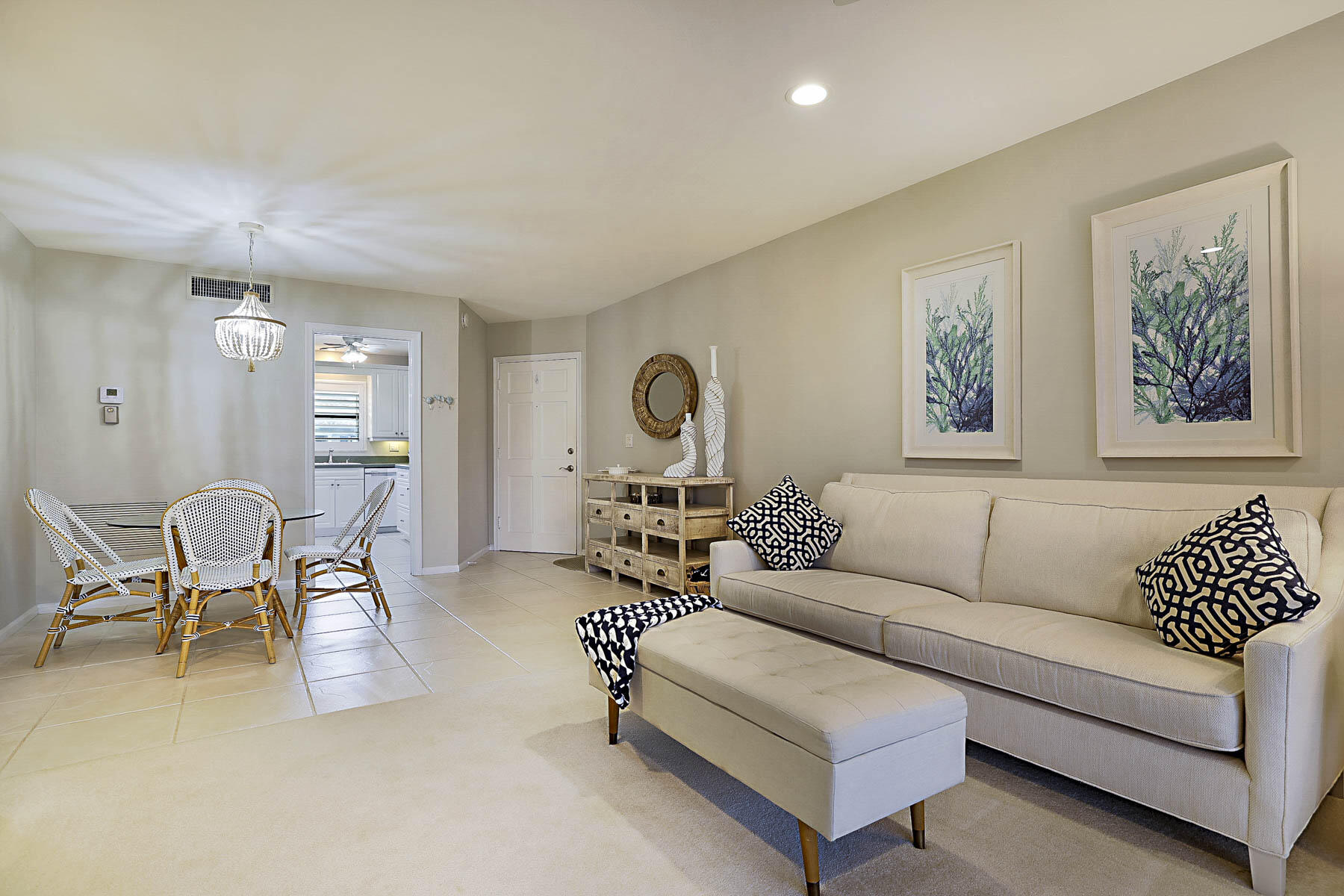 755 Saturn Street, Unit F203 Jupiter, FL 33477 - Photo 16 of 36 a living room with furniture