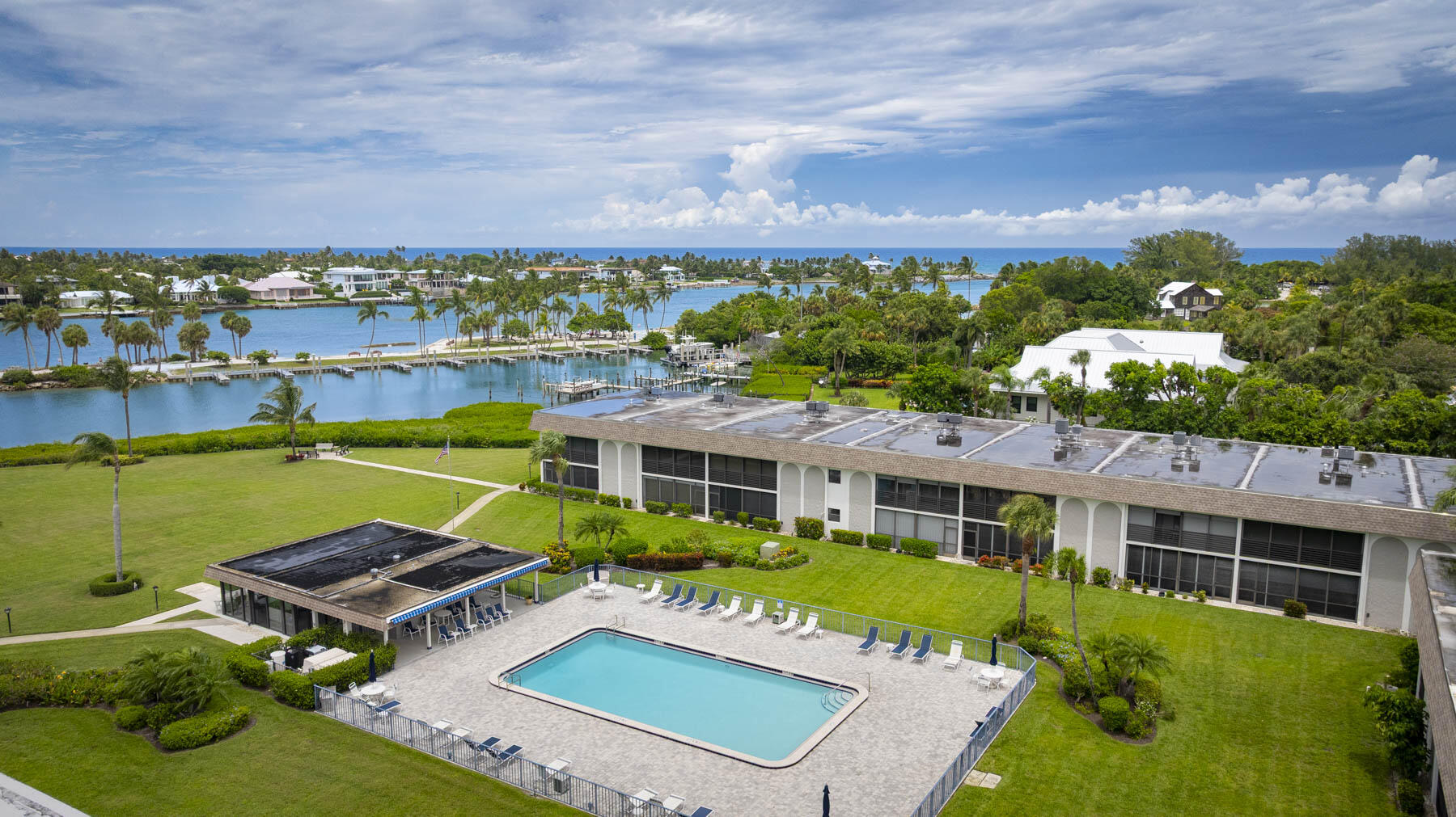 755 Saturn Street, Unit F203 Jupiter, FL 33477 - Photo 36 of 36 an aerial view of a house with a garden and lake view