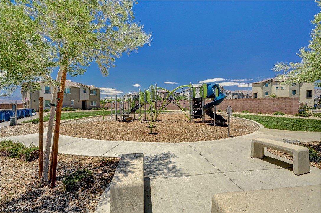 6924 Spicy Merlot Street North Las Vegas, NV 89086 - Photo 82 of 83 A vibrant playground set amidst green space offers leisure and recreation for the whole community.