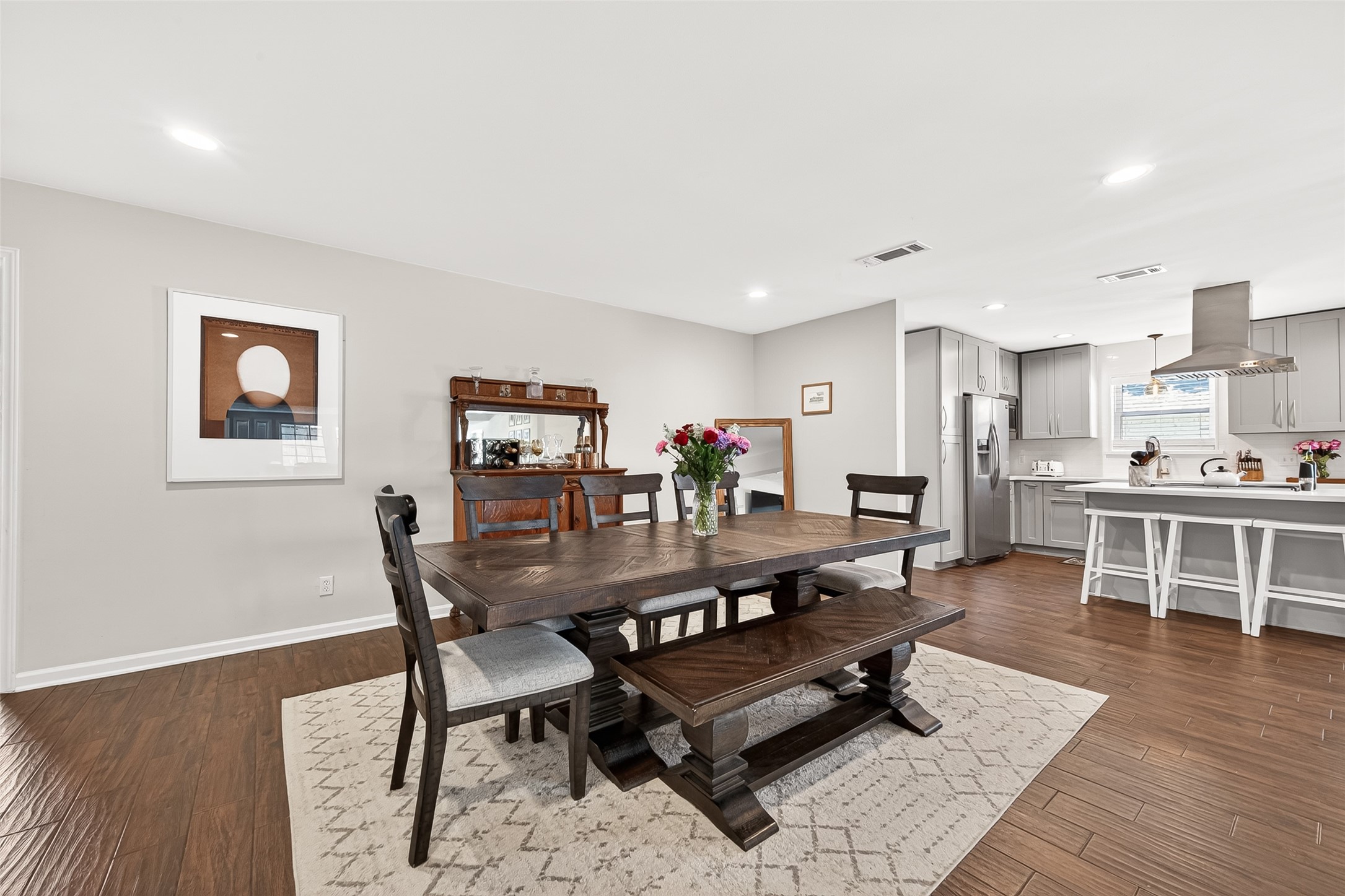 2610 Teague Road Houston, TX 77080 - Photo 21 of 49 The dining room is in front of the fireplace and sets the tone for the house - warm and inviting.