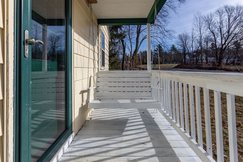 346 Amherst Road Pelham, MA 01002 - Photo 5 of 16 a view of backyard with wooden fence