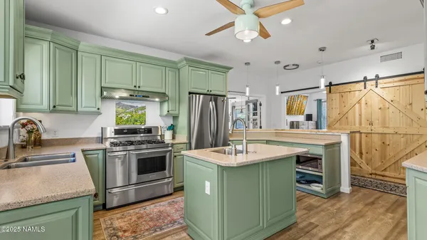 a view of entryway with wooden floor