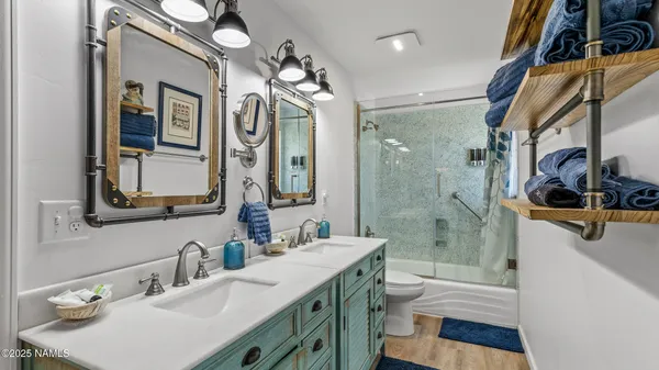 a view of storage and utility room with washer and dryer