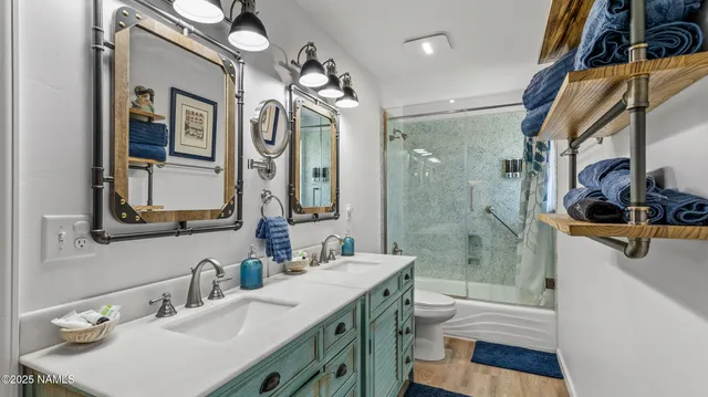 a view of storage and utility room with washer and dryer
