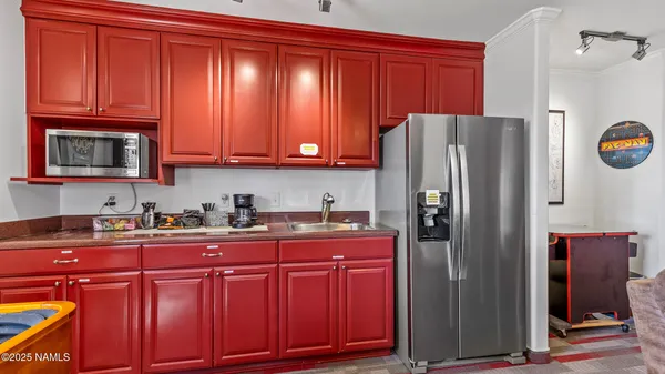 a view of a hallway with washer and dryer